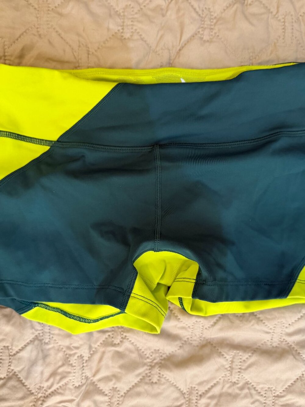 Medium yellow/green and dark blue rabbit racing spandex shorts
